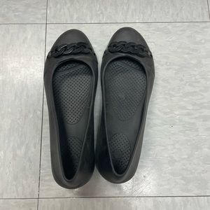 Crocs size 7 black flats with chain detail